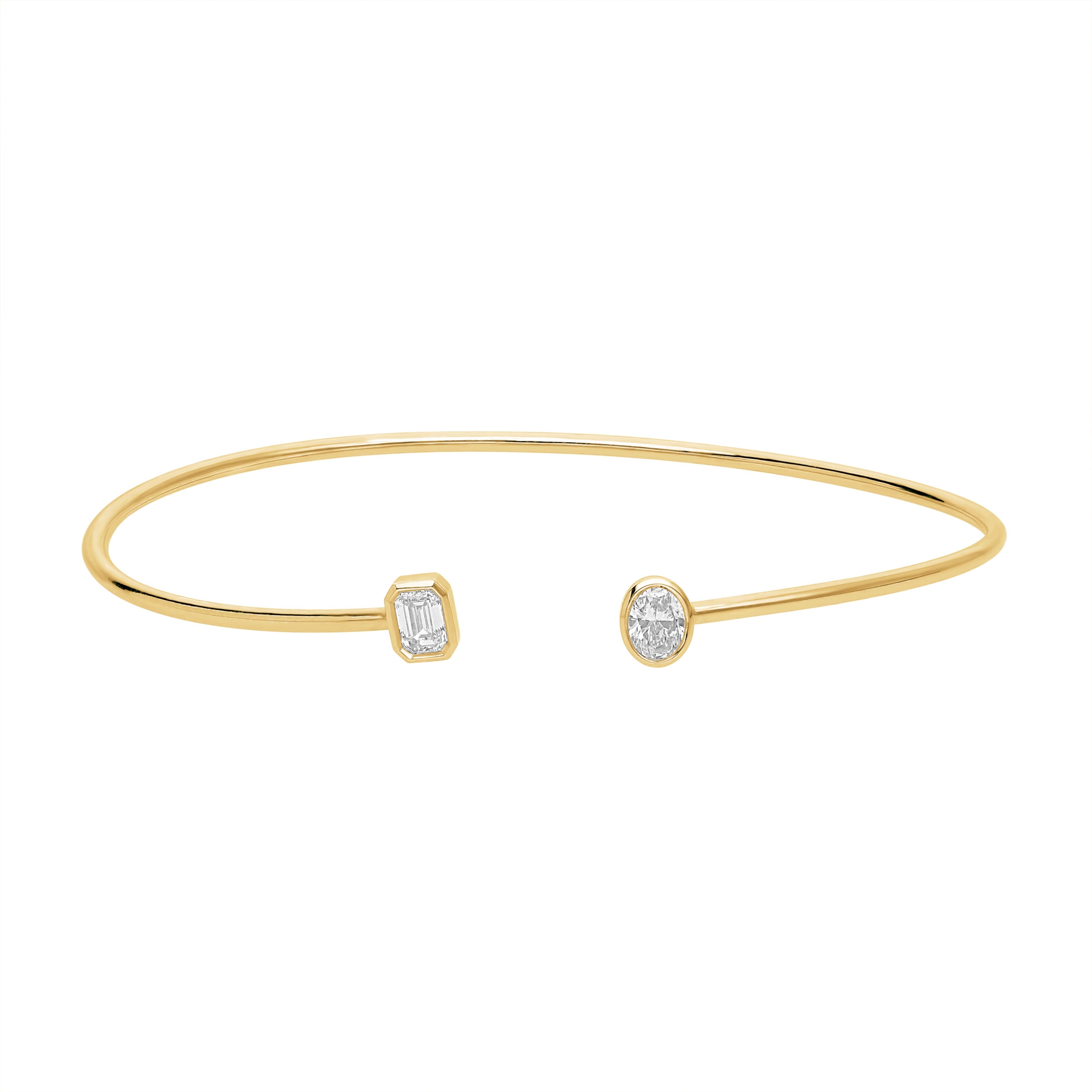 Flexibelt 14 kt. massivt guldarmbånd med oval og emerald diamant. 1 Flexibelt 14 kt. massivt guldarmbånd med oval og emerald diamant.